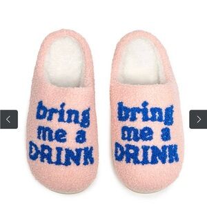 Pink Slippers with blue bring me a drink text